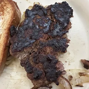 Burnt burger patty