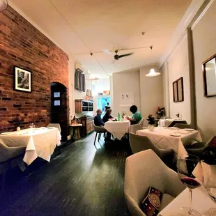 a dining room with tables and chairs