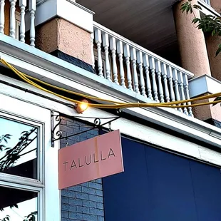 the outside of a building with balconies and balconies