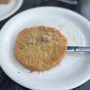 a plate with a pastry on it