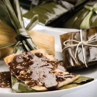 Chicken &amp; Mole tamale wrapped in a Banana Leaf (Amazing!!!)