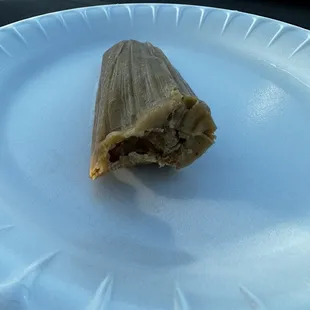 Pork tamale . We took plates &amp; forks &amp; ate in the car .