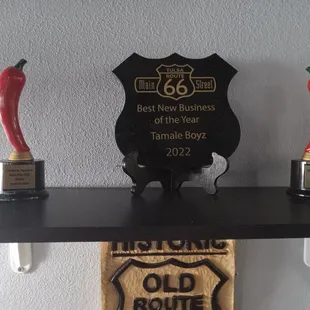 Trophies for the Tamale Boyz award winning sauces.
