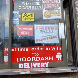 a sign in the window of a restaurant