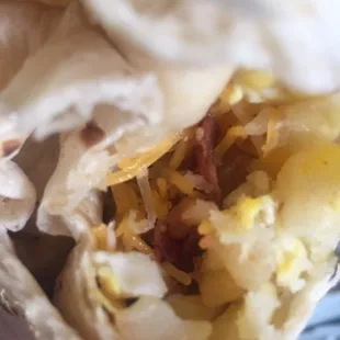 Cold breakfast burrito. so cool it can&apos;t even melt the cheese I added. :( don&apos;t recommend. No salsa, sour cream or any condiments inside.