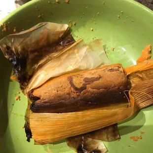 Tamale kitchen in Littleton. There are tamales were overcooked and burned.