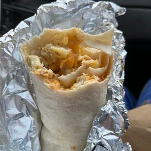 Egg and Potato Burrito special with queso