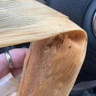 Red chili 1/2 Dozen Tamales never fails idk why I keep going back to this roach infested place.