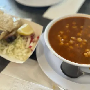 Toppings included with the Tamazole- cabbage, lemon quarter, radish slices, tortilla chips