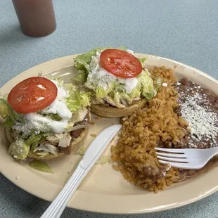 Chicken sopes and rice and beans
