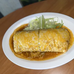 - Wet Burrito:
 with cheese, rice, beans, cilantro, onion choice of salsa and meat.