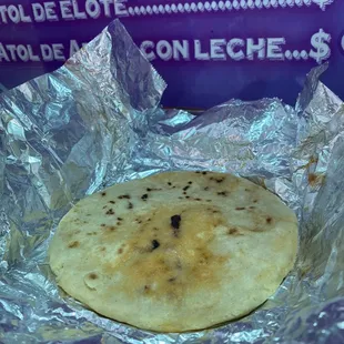 a tortilla wrapped in foil
