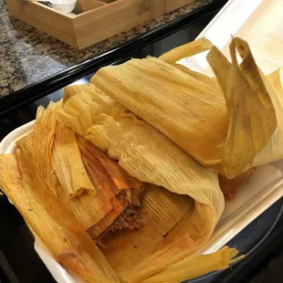 Pile of tamales! Some green, some red