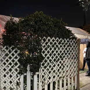 You can see the outside of Tamales Brenda, with a few customers starting to line up.