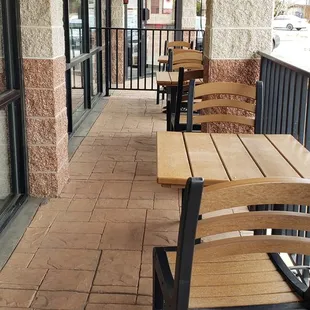 Outdoor seating in front of the restaurant.