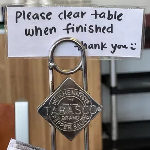 a note attached to a table