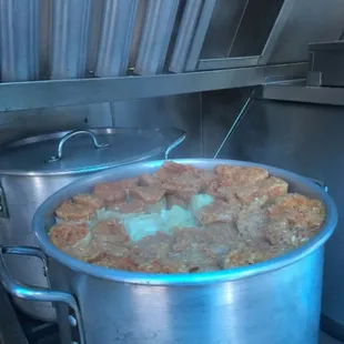 A pot of fresh tamales