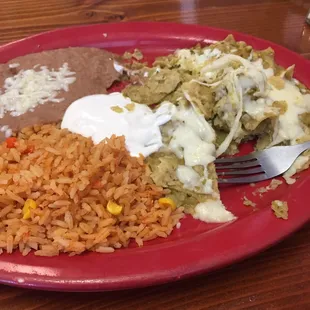 Half-eaten Chilaquiles because they were too yummy to stop and take a picture lol.