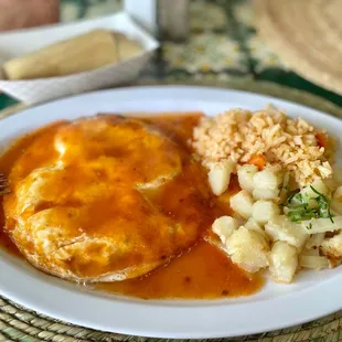 Huevos Rancheros with side of rice &amp; potatoes