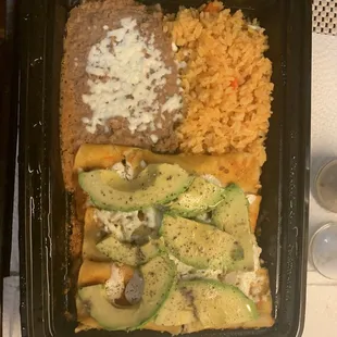 Red enchiladas plate &amp; I added the avocado myself.