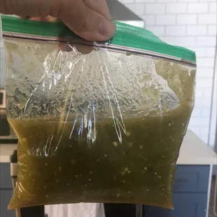 Big bag of salsa with an order of 18 tamales