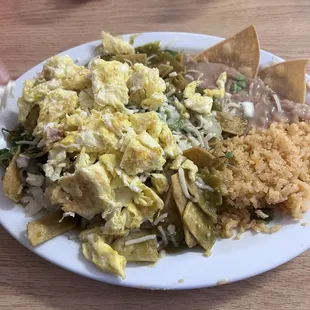 Chilaquiles verdes with added cebolla &amp; cilantro.