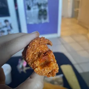 One little strand of meat lmao the green ones taste better and have more meat