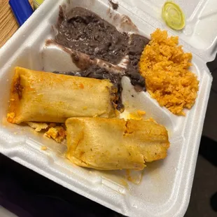 3 chicken Tamales Especial (they smelled so good that i ate one on the way home)