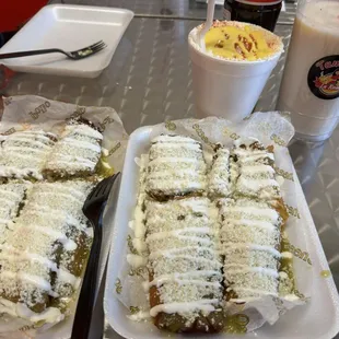 Tamales and also there corn in a cup, homemade horchata