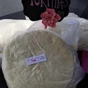 tortillas wrapped in plastic wrap