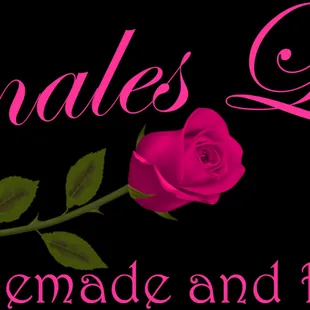 a pink rose on a black background