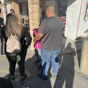 You really do get excited as the line closes in. One person per party, two people inside.