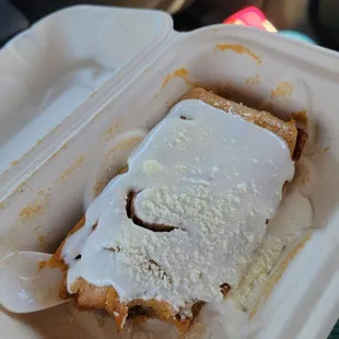 Pork tamales on plate with sour cream and cheese on top $5