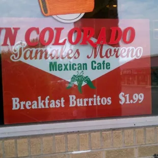 a sign in the window of a restaurant