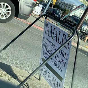 Sign directing to food stand