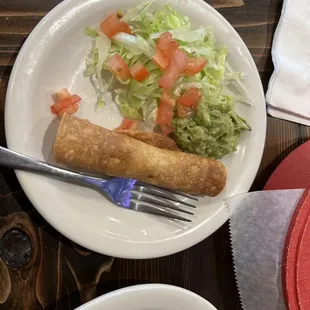 a plate of food and a fork