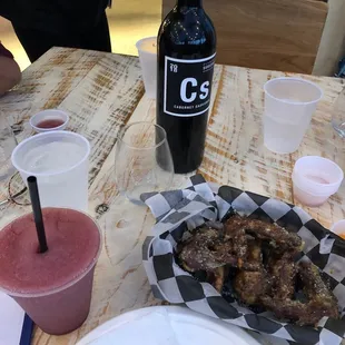 Red wine slushy, garlic parm wings, and red wine