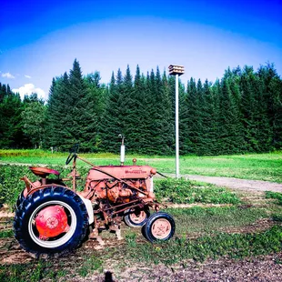 an old tractor in a field