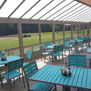 Our fully enclosed screened patio is ready for you! Enjoy your pizza, wings, and wine outside without bugs.