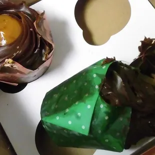 Cupcake dropped into box.