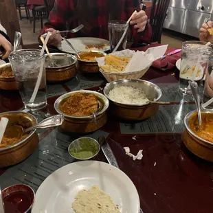 Enjoying chicken tiki masala, chicken curry &amp; chicken vindaloo along with spicy naan &amp; garlic naan. Delicious!