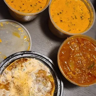 2 chicken tikka masalas, my eggplant dish, and samosa chaat. Just ok