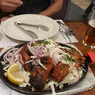 Chicken tandoori is savory and not hot spicy. Tender and delicious