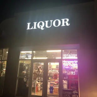 a liquor store at night