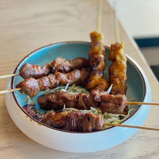 sweet soy ribeye / chicken satay / spicy lamb  get the chicken satay!