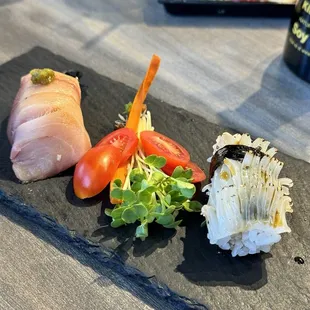 Yellow tail and squid sushi