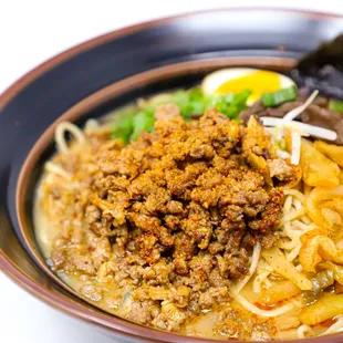 a close up of a bowl of ramen