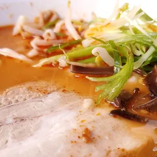 a close up of a bowl of ramen