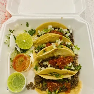 tacos in a styrofoam container