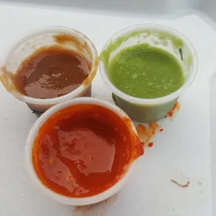 Red is Chile de árbol  spicy the other sauce is a tomato base sauce medium spicy, the green is a Chilecate a mix with Chile &amp; Avocado